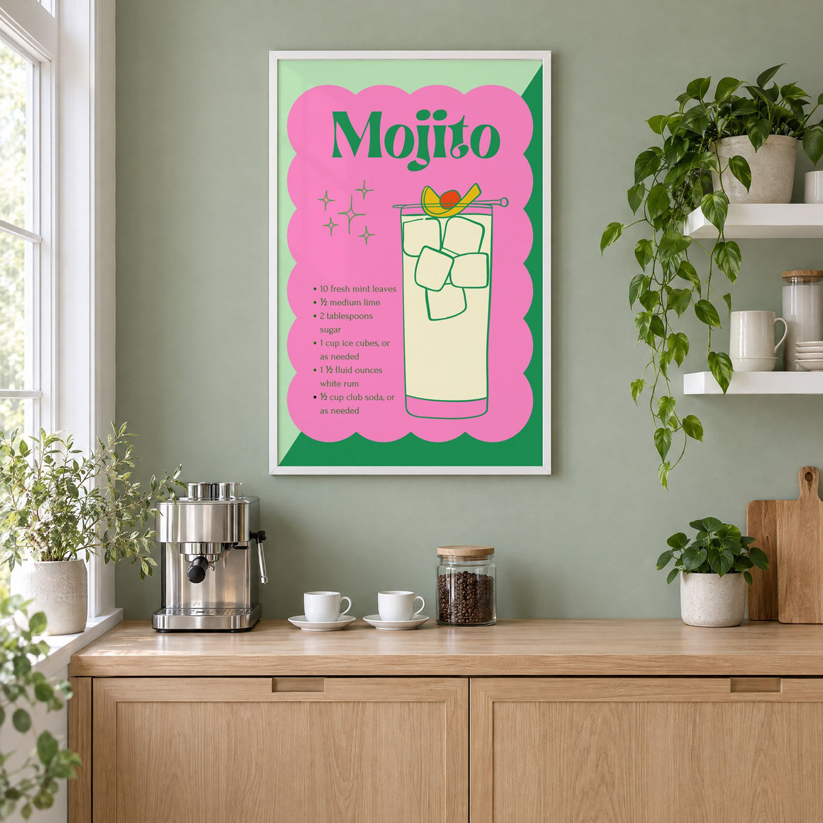 Mojito recipe retro scalloped print in a white frame on a sage green coffee nook wall above an espresso machine