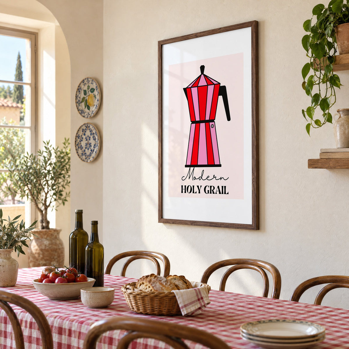 Moka pot pink and red striped print in a walnut frame above a gingham-covered trattoria table, seen at an angle
