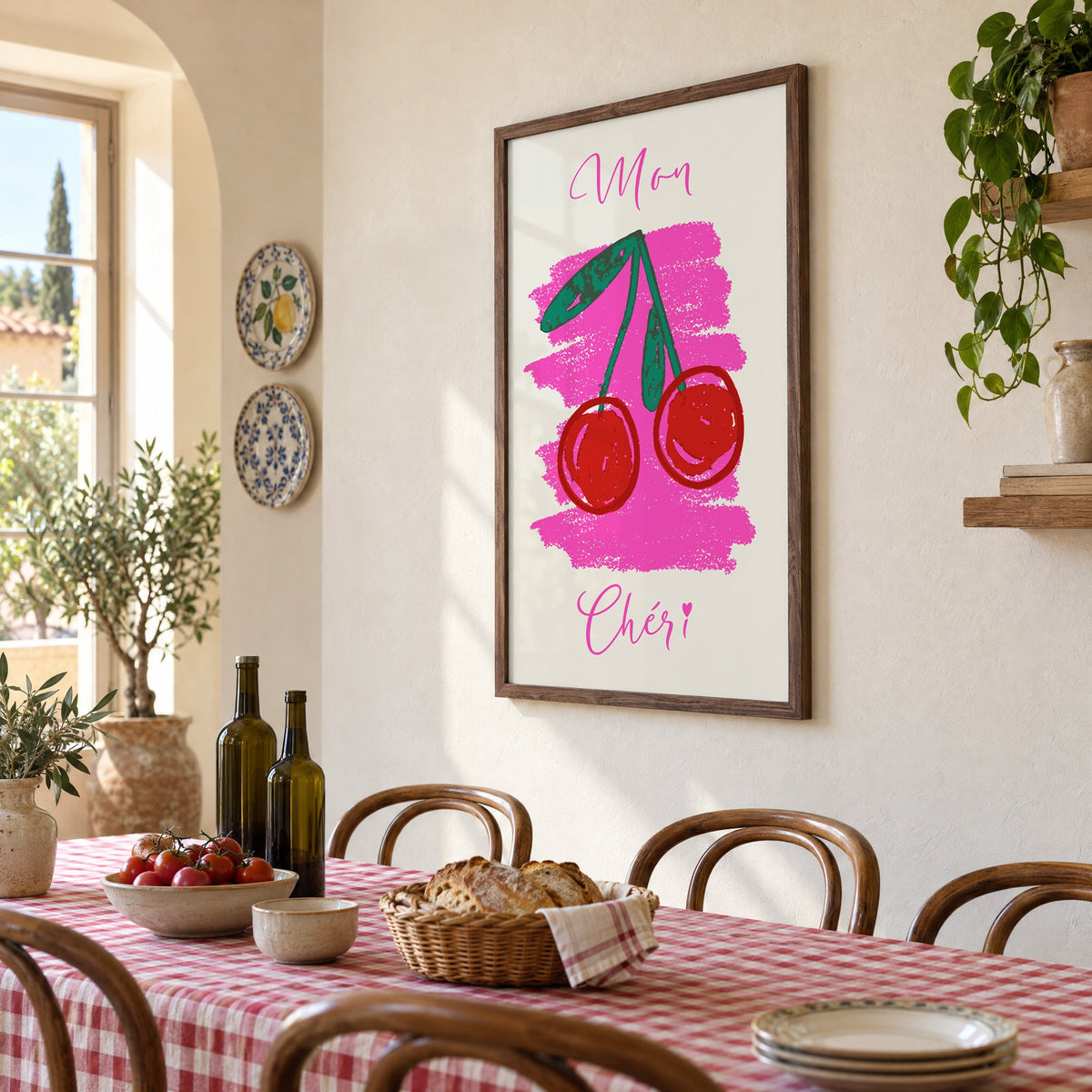 Mon Chéri cherries crayon print in a walnut frame above a gingham-covered trattoria table, seen at an angle