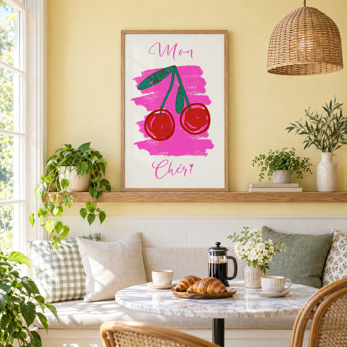 Mon Chéri cherries crayon print in an oak frame on a picture ledge above a sunny breakfast nook