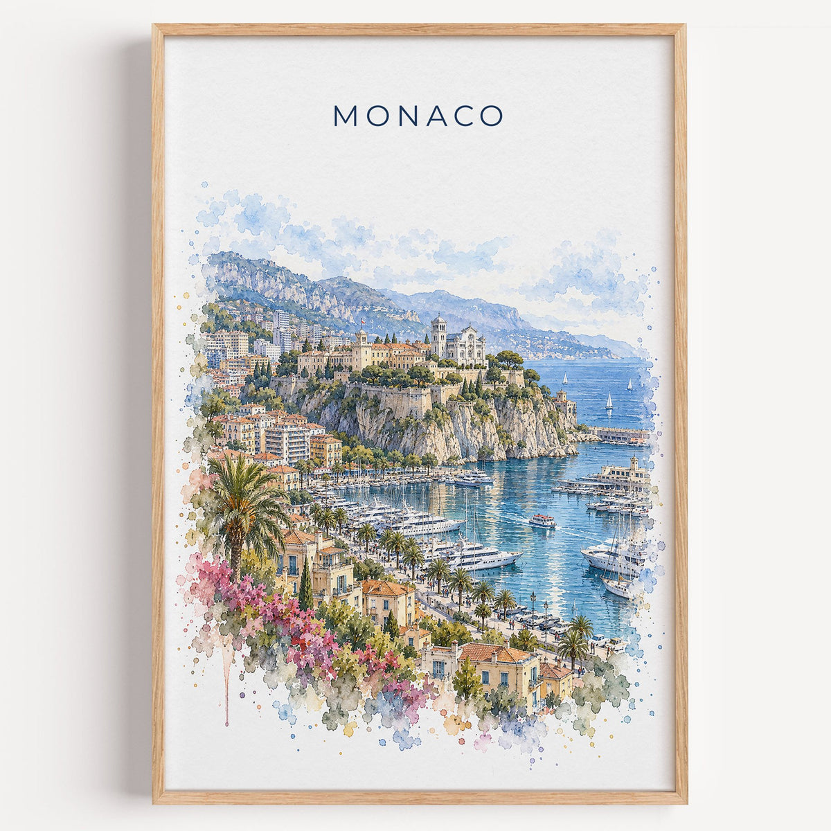 Monaco watercolor print in a light oak frame on a plain white wall