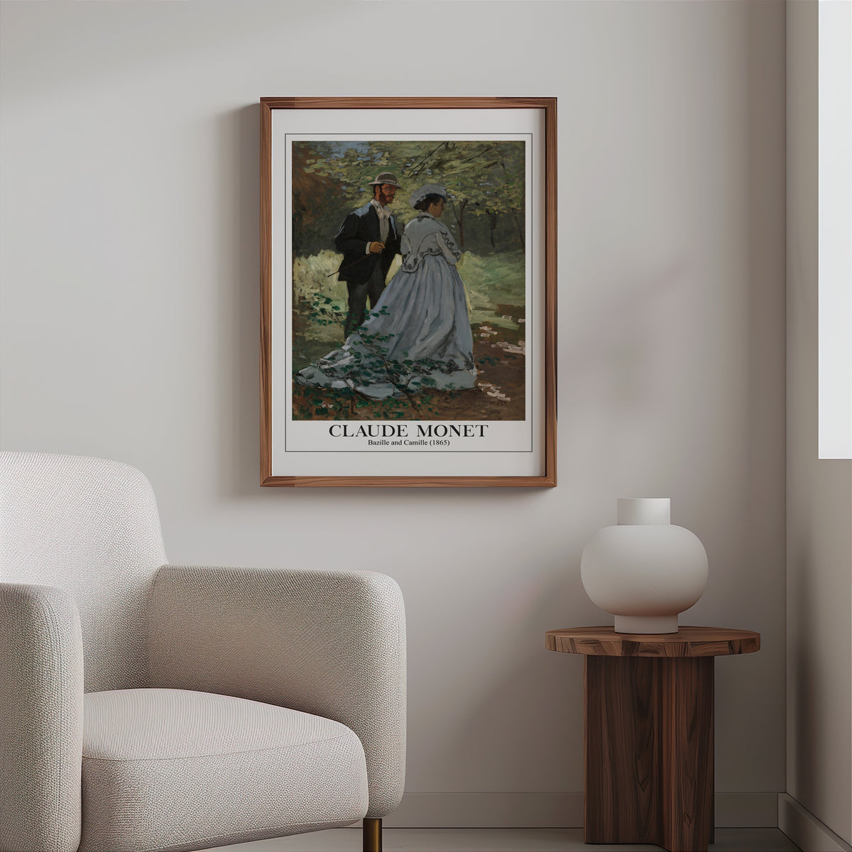 Monet forest path print in a slim walnut frame above a bouclé armchair