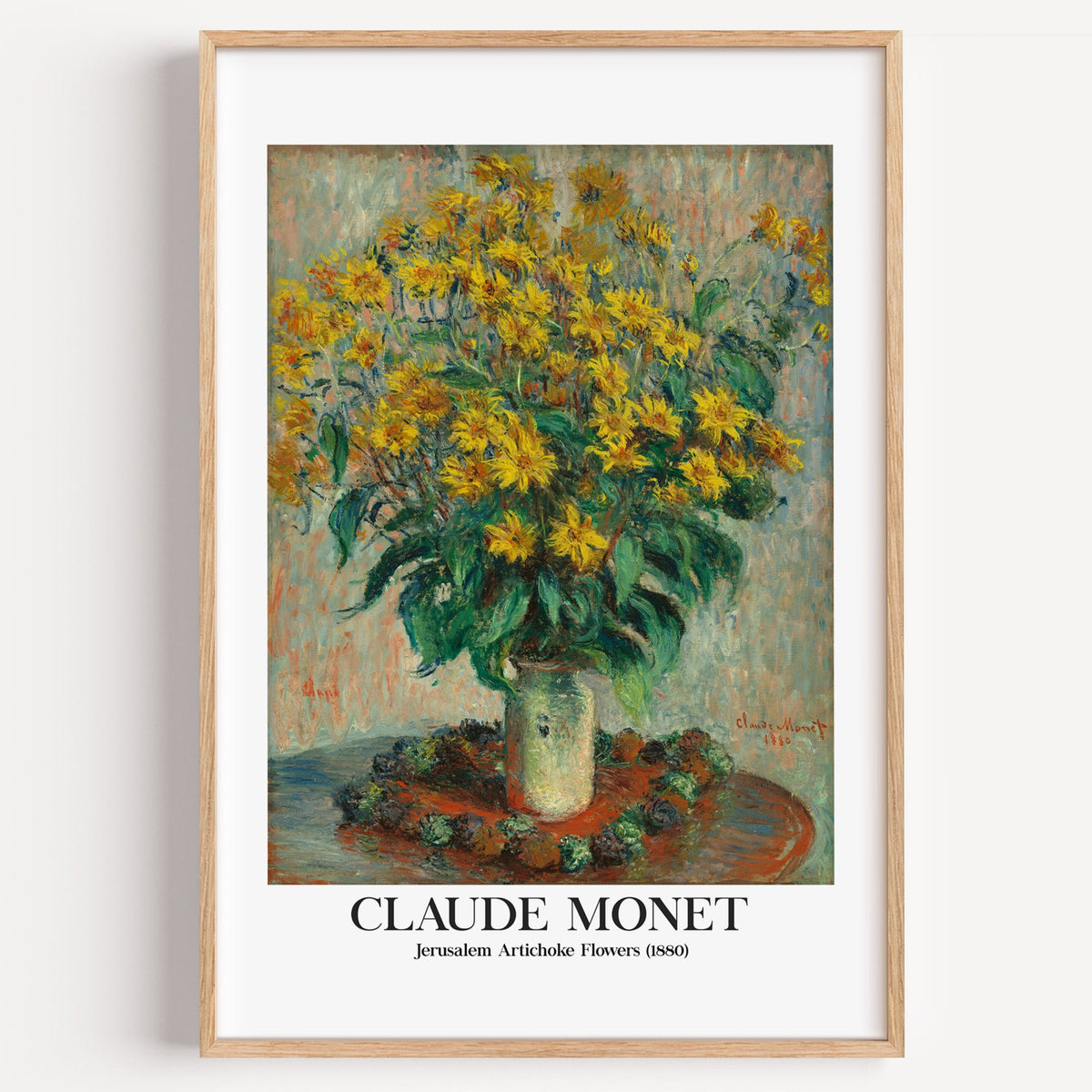 Monet Jerusalem Artichoke Flowers print in a light oak frame on a plain white wall
