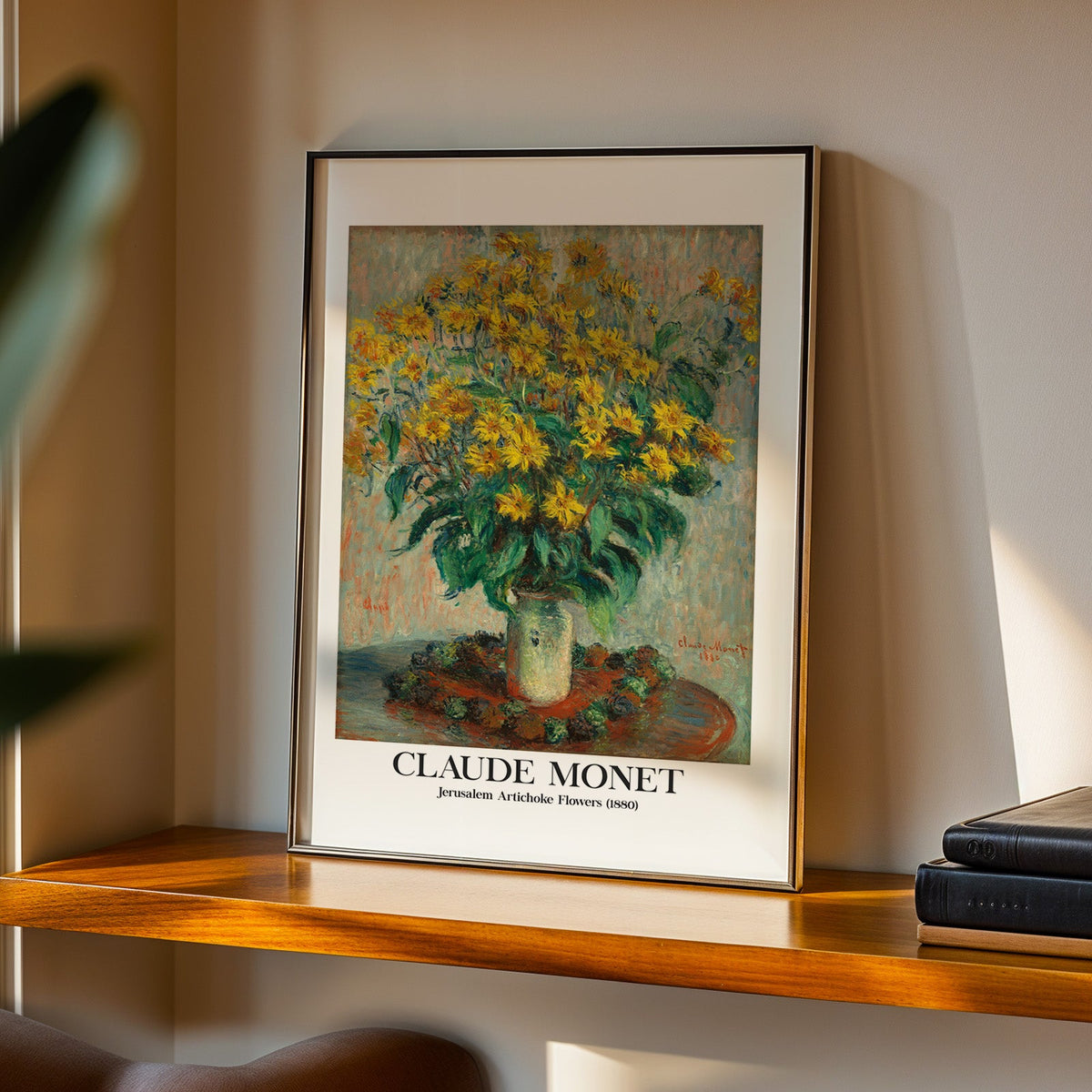 Jerusalem Artichoke Flowers print in a black frame on a walnut shelf in evening light