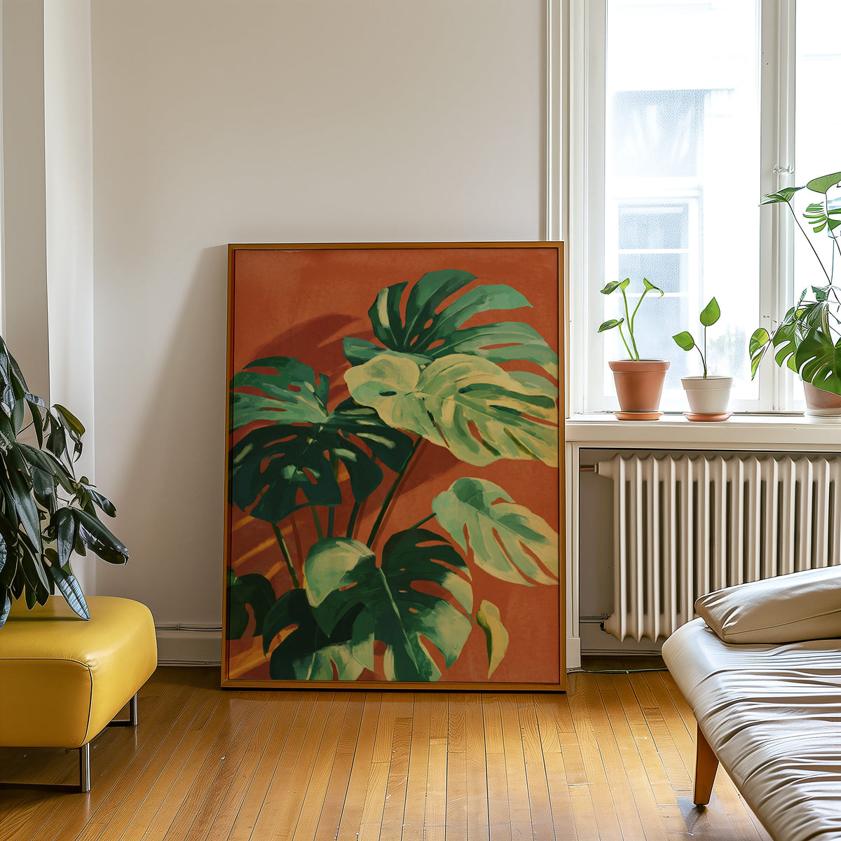 Sunlit monstera print in an oak frame leaning beside a yellow leather bench