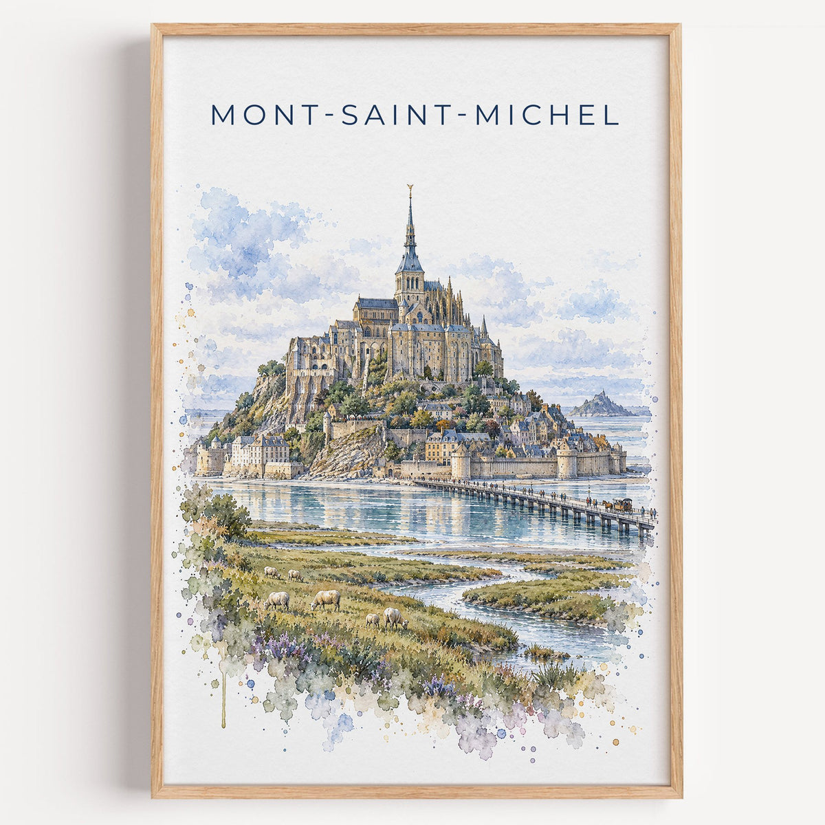 Mont-Saint-Michel watercolor print in a light oak frame on a plain white wall