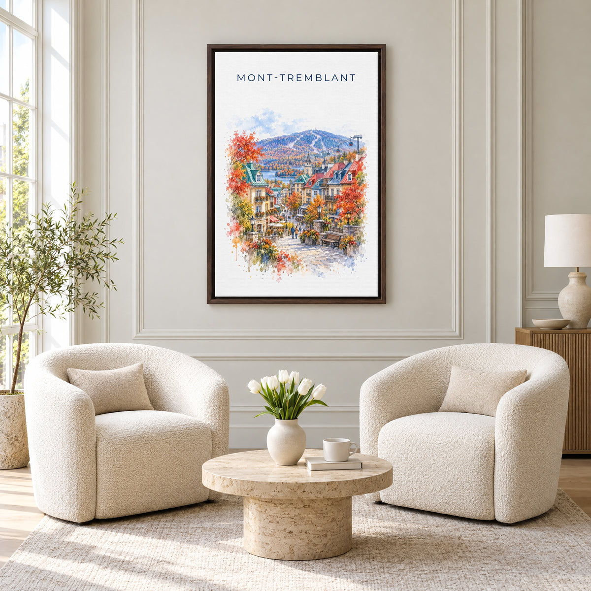 Mont-Tremblant watercolor print as an espresso floater canvas above two boucle armchairs in a hotel lounge