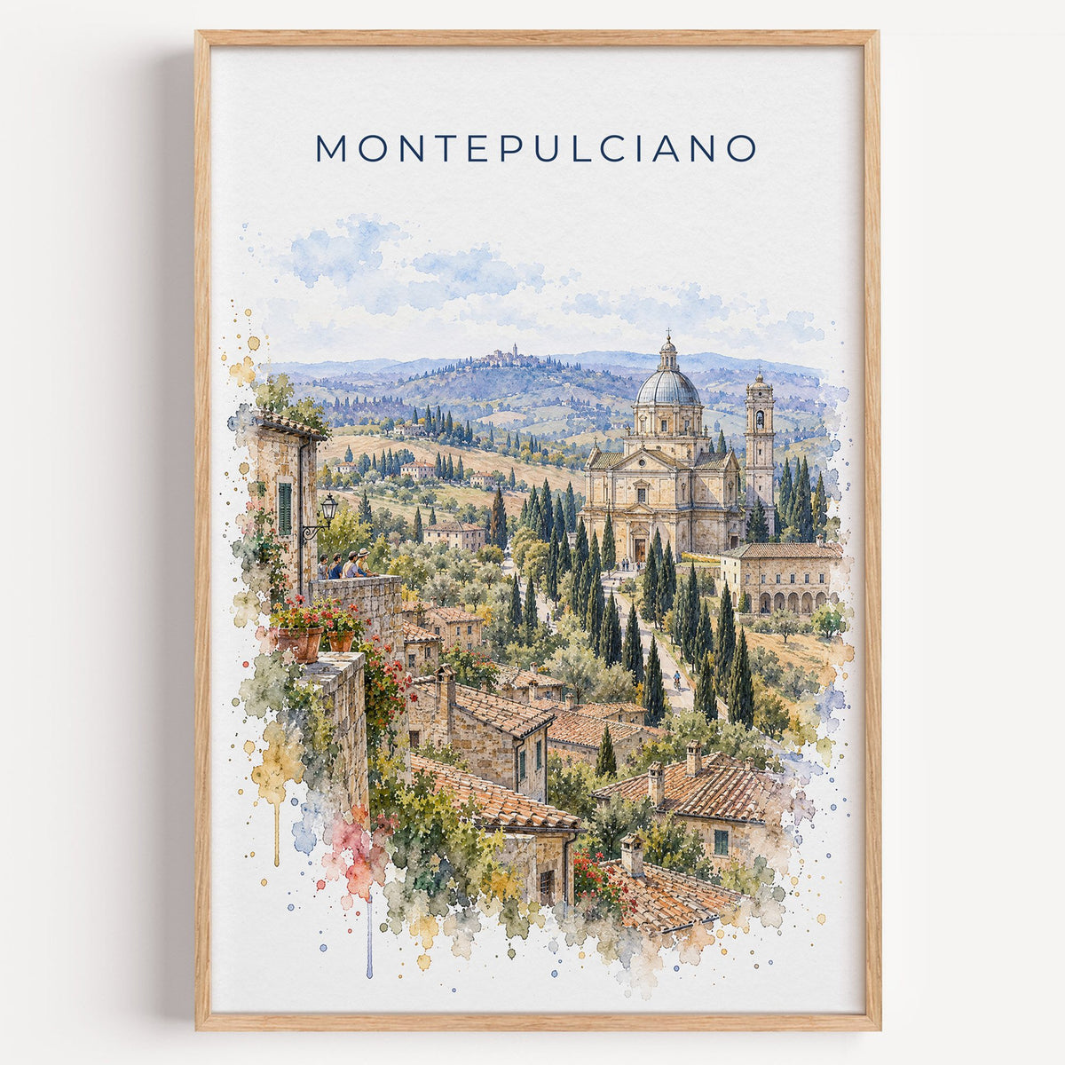 Montepulciano watercolor print in a light oak frame on a plain white wall