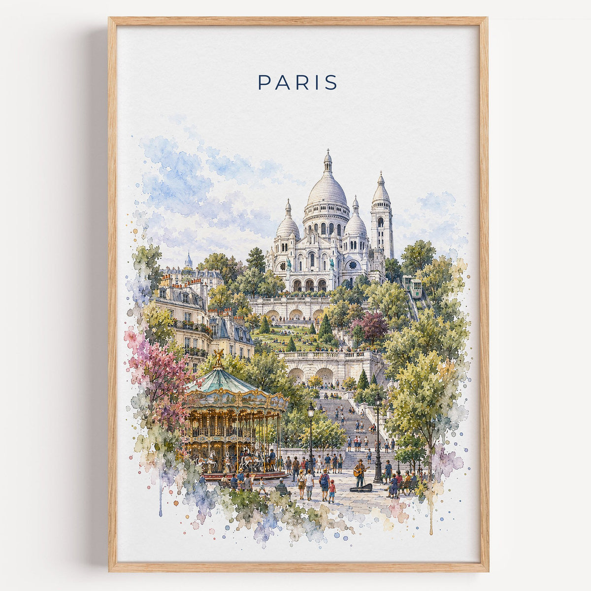 Montmartre Paris watercolor print in a light oak frame on a plain white wall