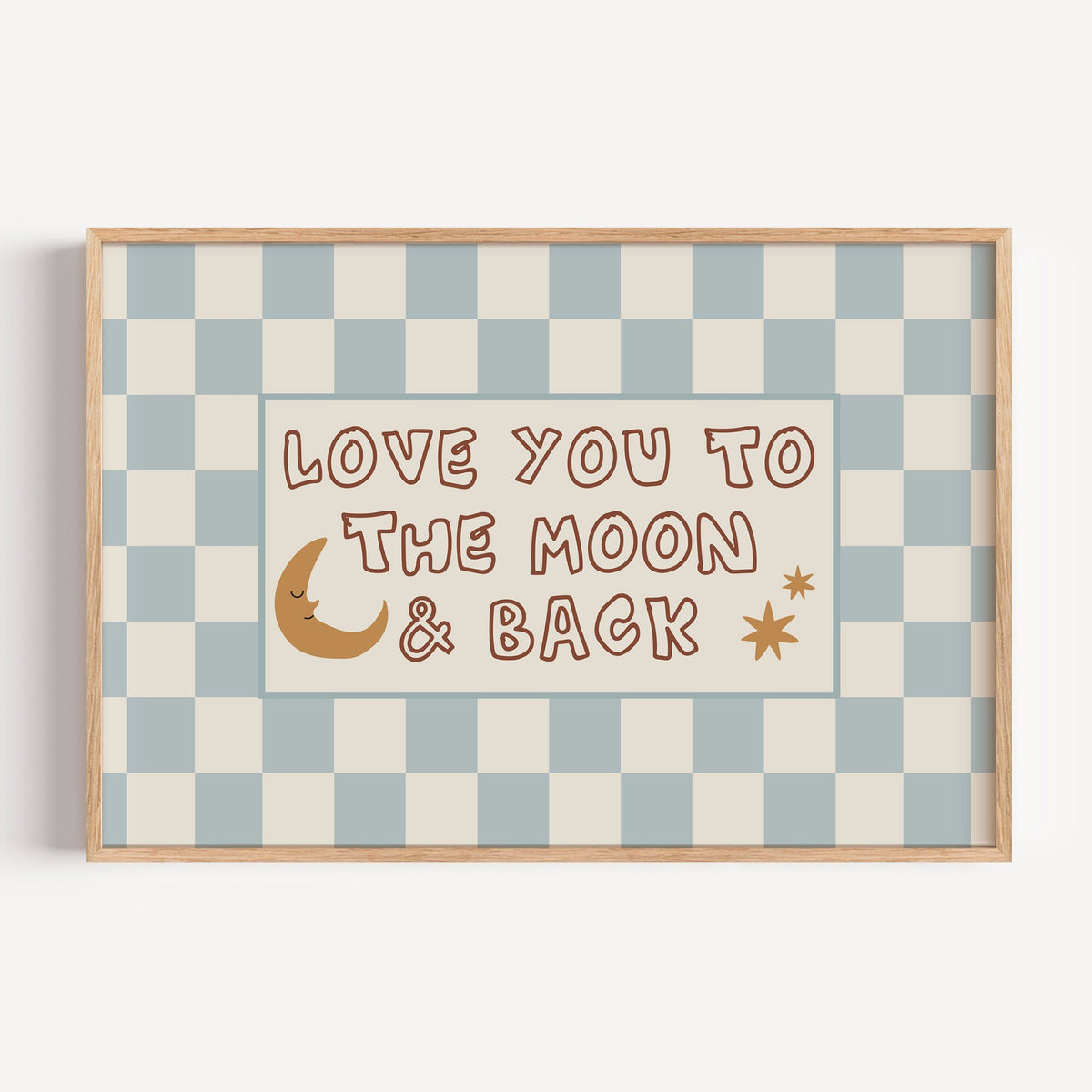 Landscape love you to the moon nursery print in a light oak frame on a plain white wall