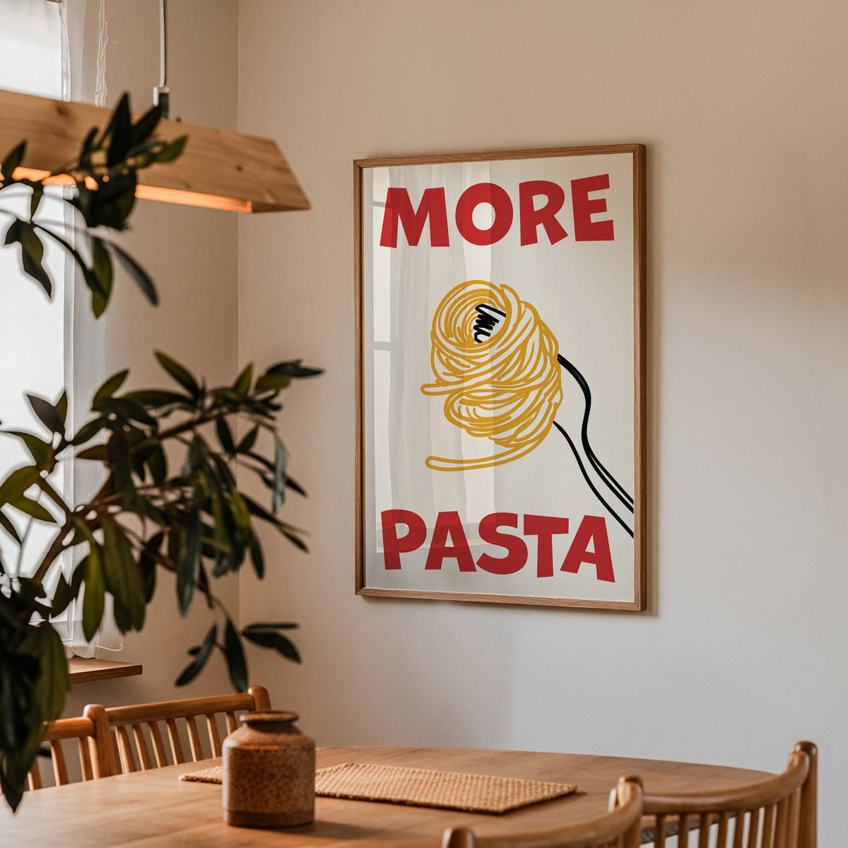 More pasta spaghetti print in a walnut frame above a dining table beside an olive tree
