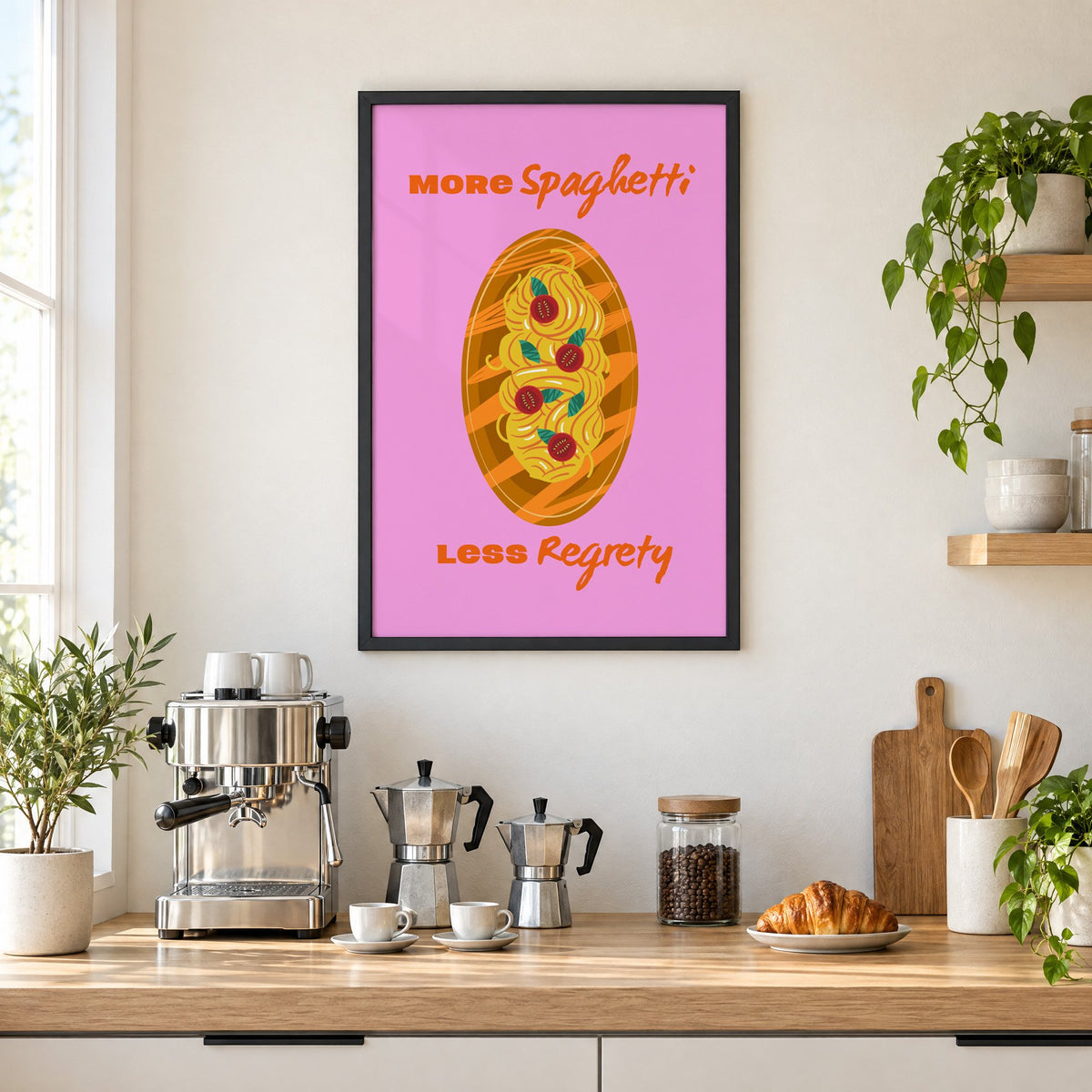 MORE Spaghetti LESS Regrety pasta plate print in a black frame above a home espresso bar with moka pots and espresso cups