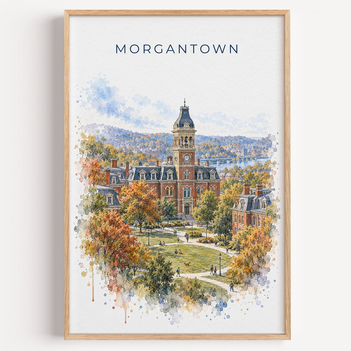 Morgantown watercolor print in a light oak frame on a plain white wall