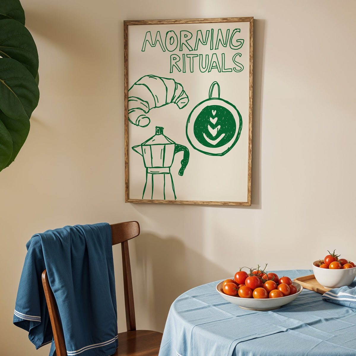 Morning rituals coffee line print in an oak frame above a blue linen table with tomatoes