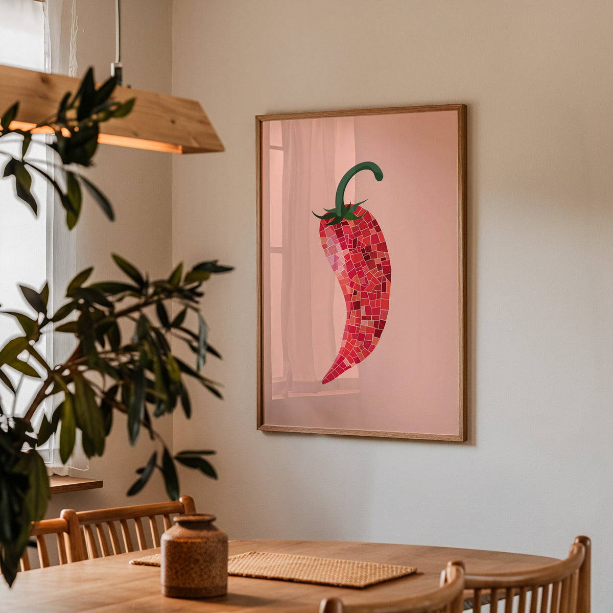 Mosaic chilli print in a walnut frame above a dining table with olive branches
