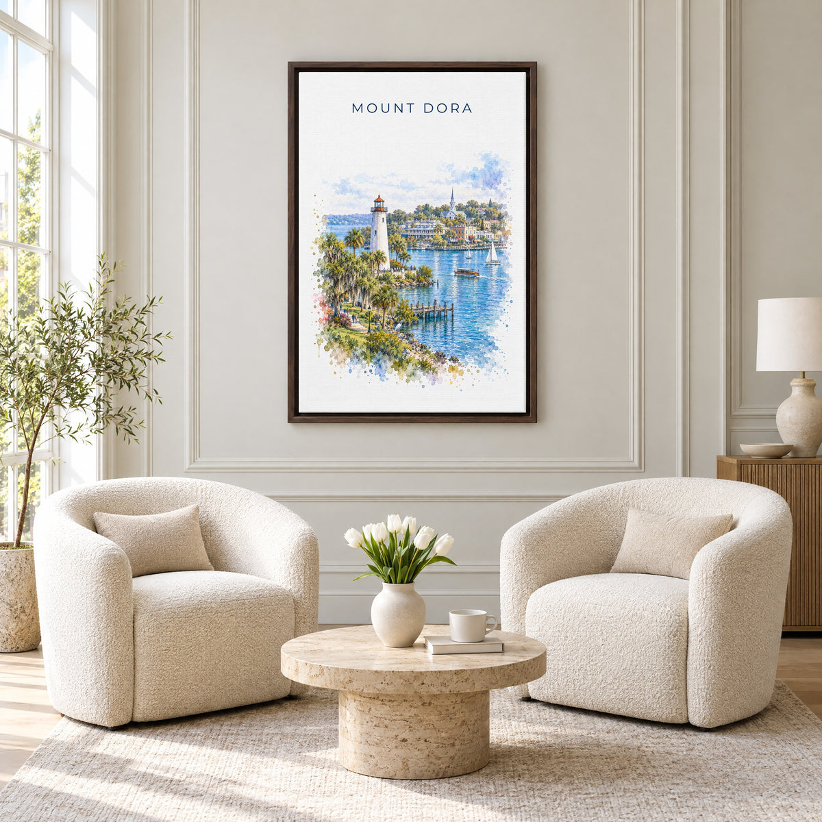 Mount Dora, Florida watercolor print as an espresso floater canvas above two boucle armchairs in a hotel lounge