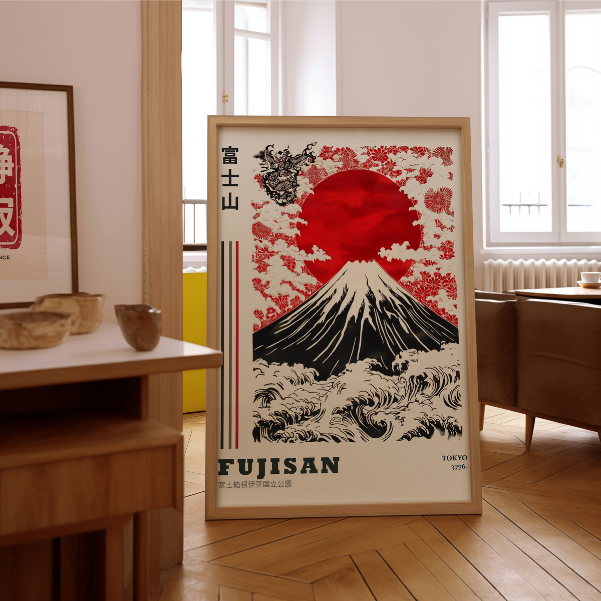 Red sun Mount Fuji floral wave print in an oak frame on the parquet floor of a sunlit living room