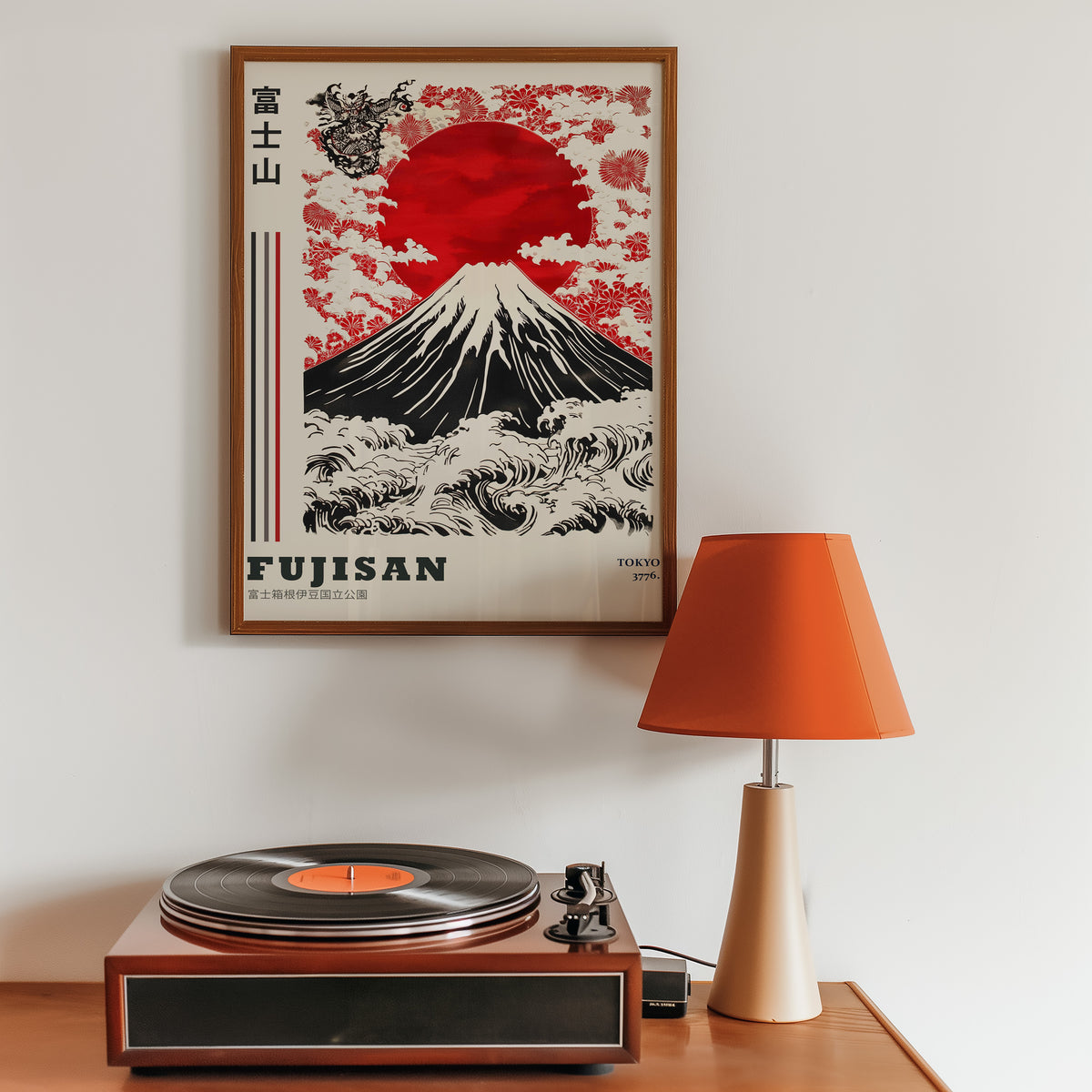 Red sun Mount Fuji floral wave print in a walnut frame above a sideboard with a record player