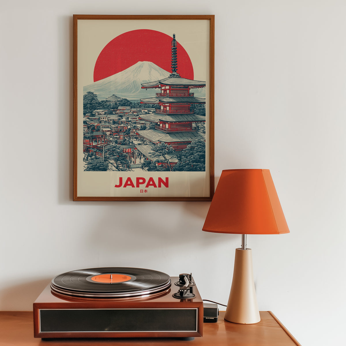 Retro Mount Fuji red pagoda print in a walnut frame above a sideboard with a record player