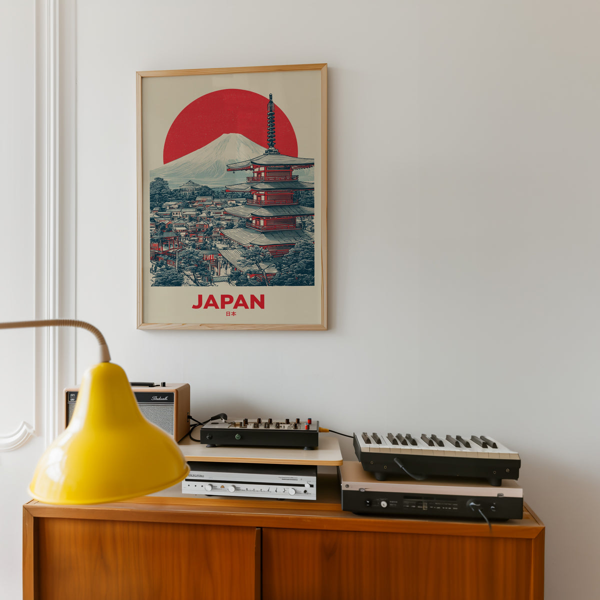Retro Mount Fuji red pagoda print in an oak frame above a teak sideboard with vintage hi-fi