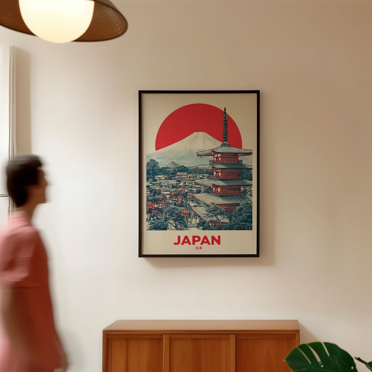 Retro Mount Fuji red pagoda print in a black frame in a hallway under a rattan pendant