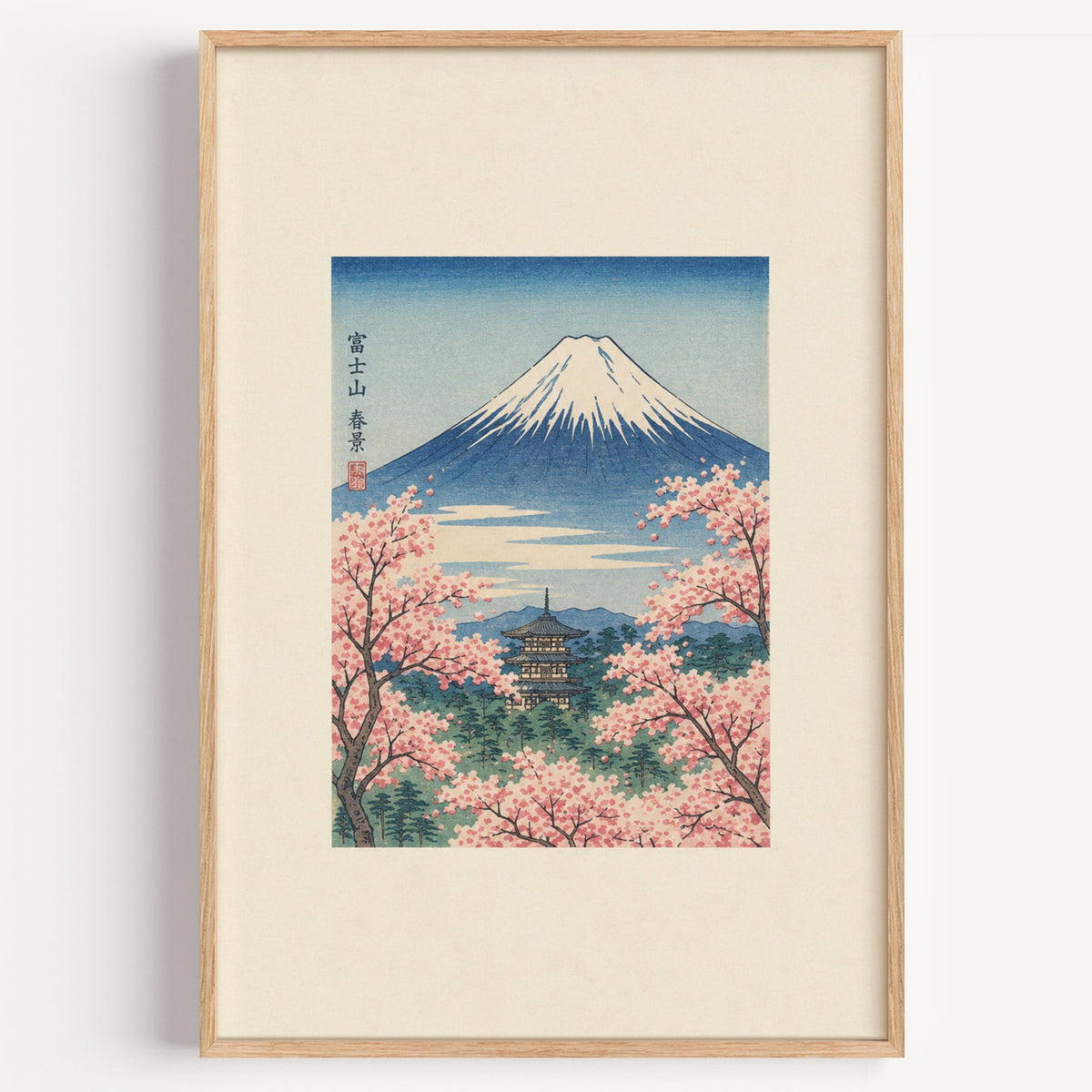 Mount Fuji with pagoda in spring print in a light oak frame on a plain white wall