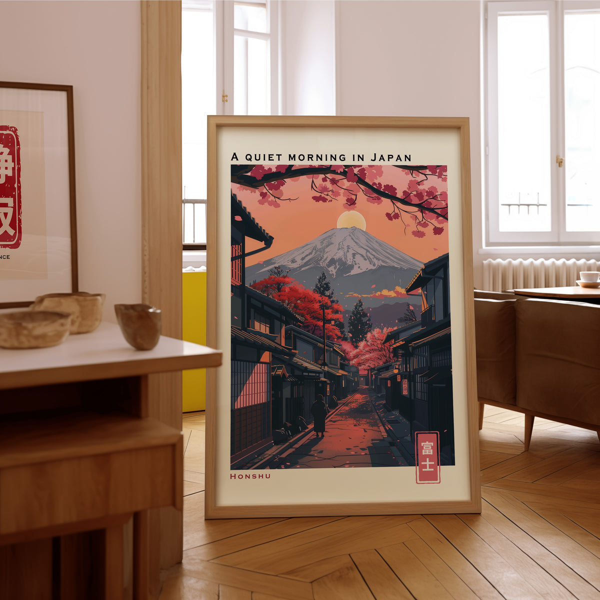 Quiet morning Fuji street print in an oak frame on the parquet floor of a sunlit living room