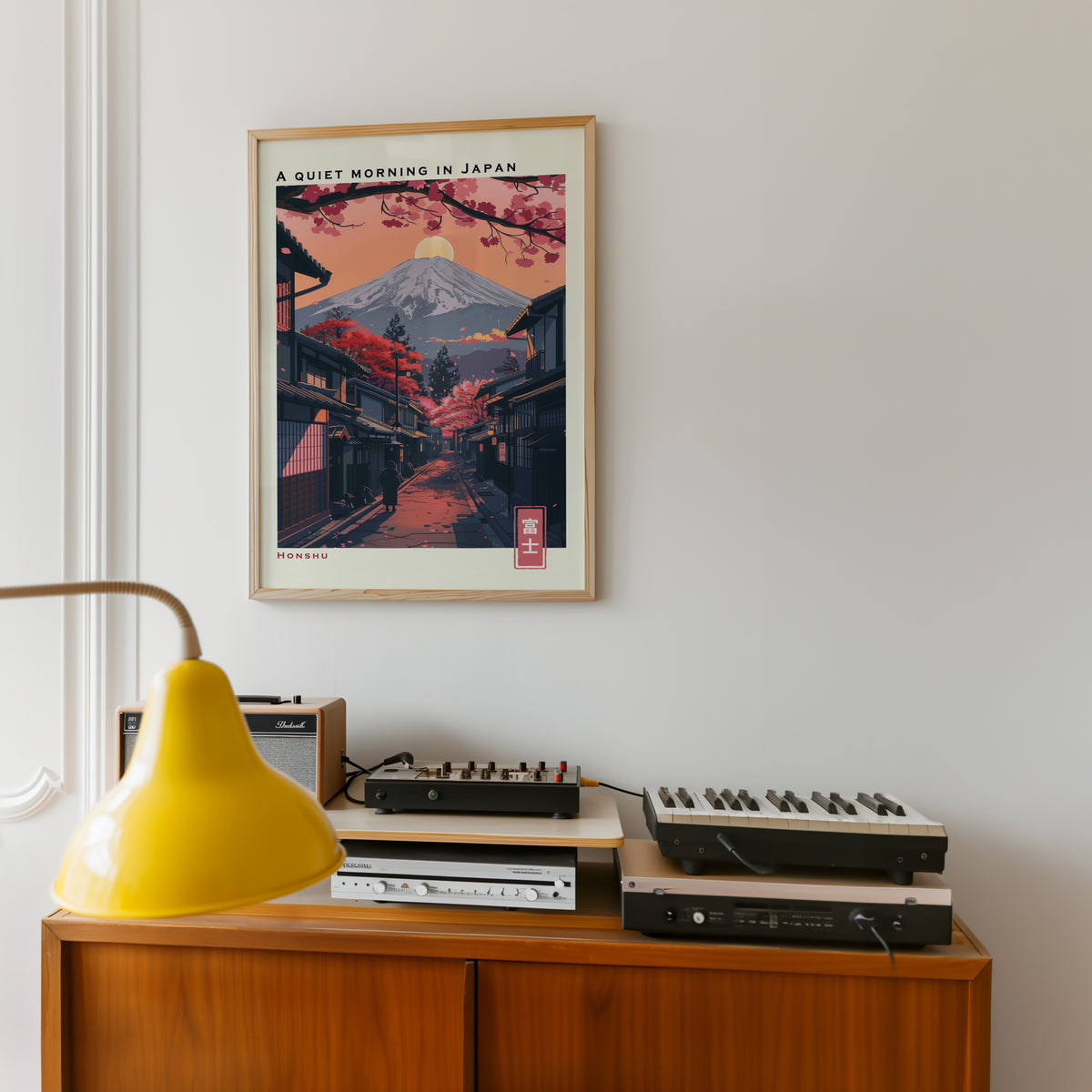 Quiet morning Fuji street print in an oak frame above a teak sideboard with vintage hi-fi