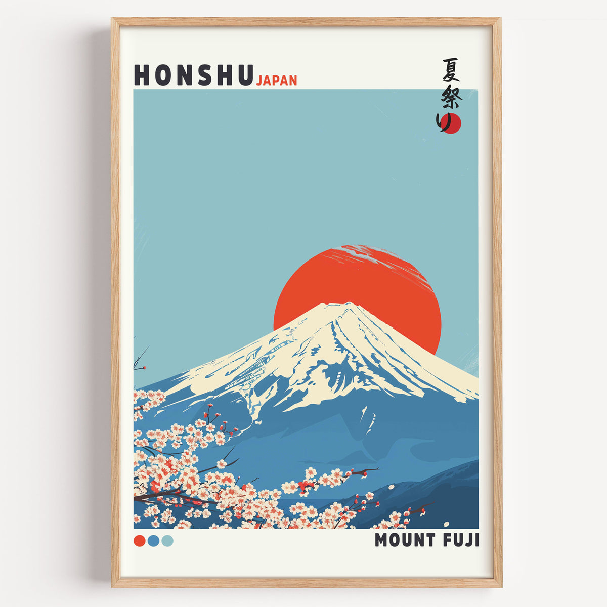 Mount Fuji red sun sakura print in a light oak frame on a plain white wall