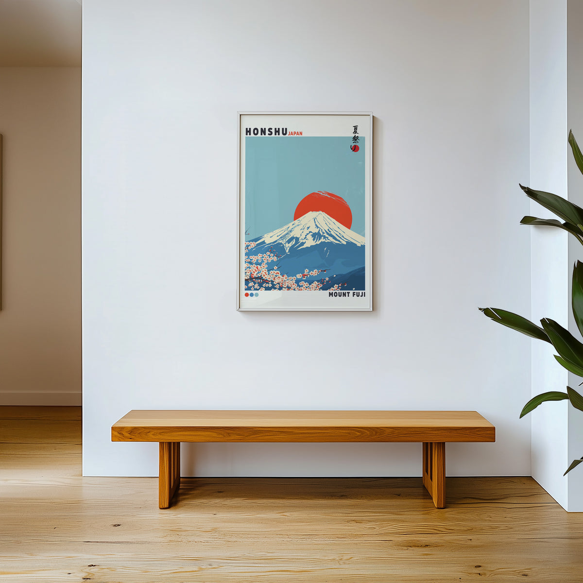 Mount Fuji red sun sakura print shown in a white frame above a wooden entryway bench