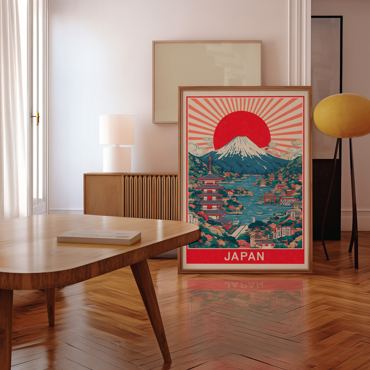 Mount Fuji sunburst lake print in a walnut frame leaning in a mid-century living room