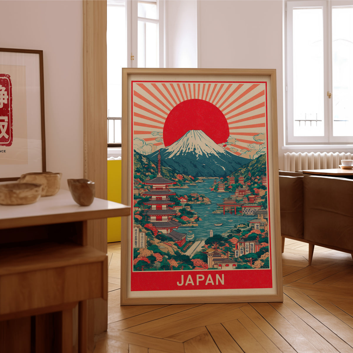 Mount Fuji sunburst lake print in an oak frame on the parquet floor of a sunlit living room