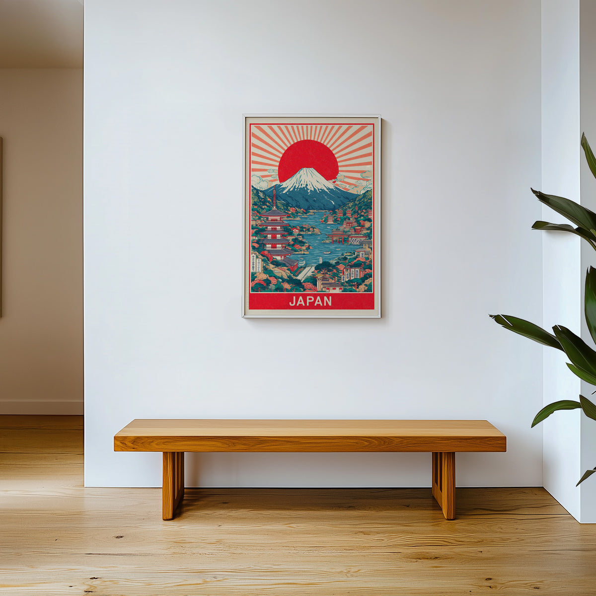 Mount Fuji sunburst lake print shown in a white frame above a wooden entryway bench