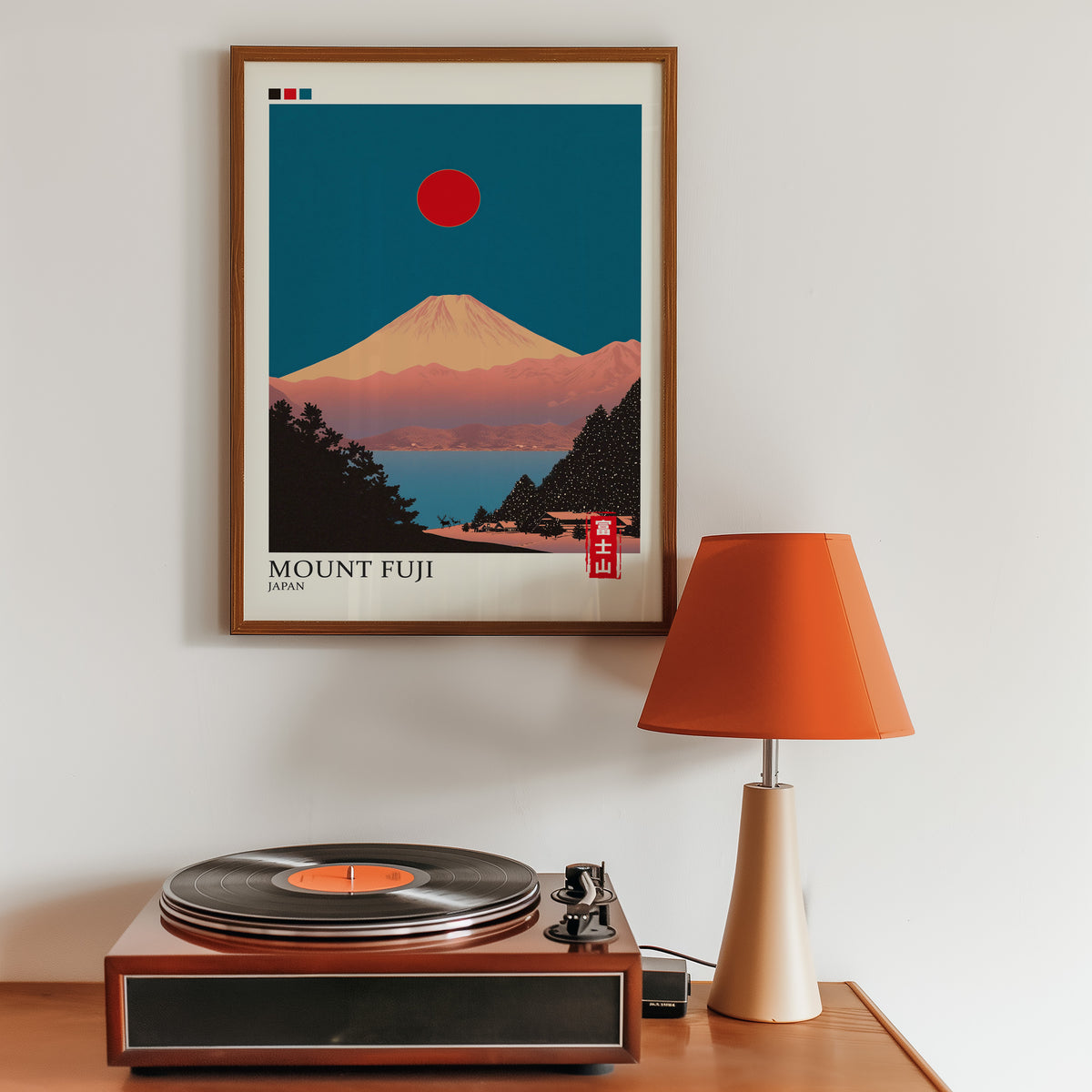 Minimalist Fuji teal sky print in a walnut frame above a sideboard with a record player