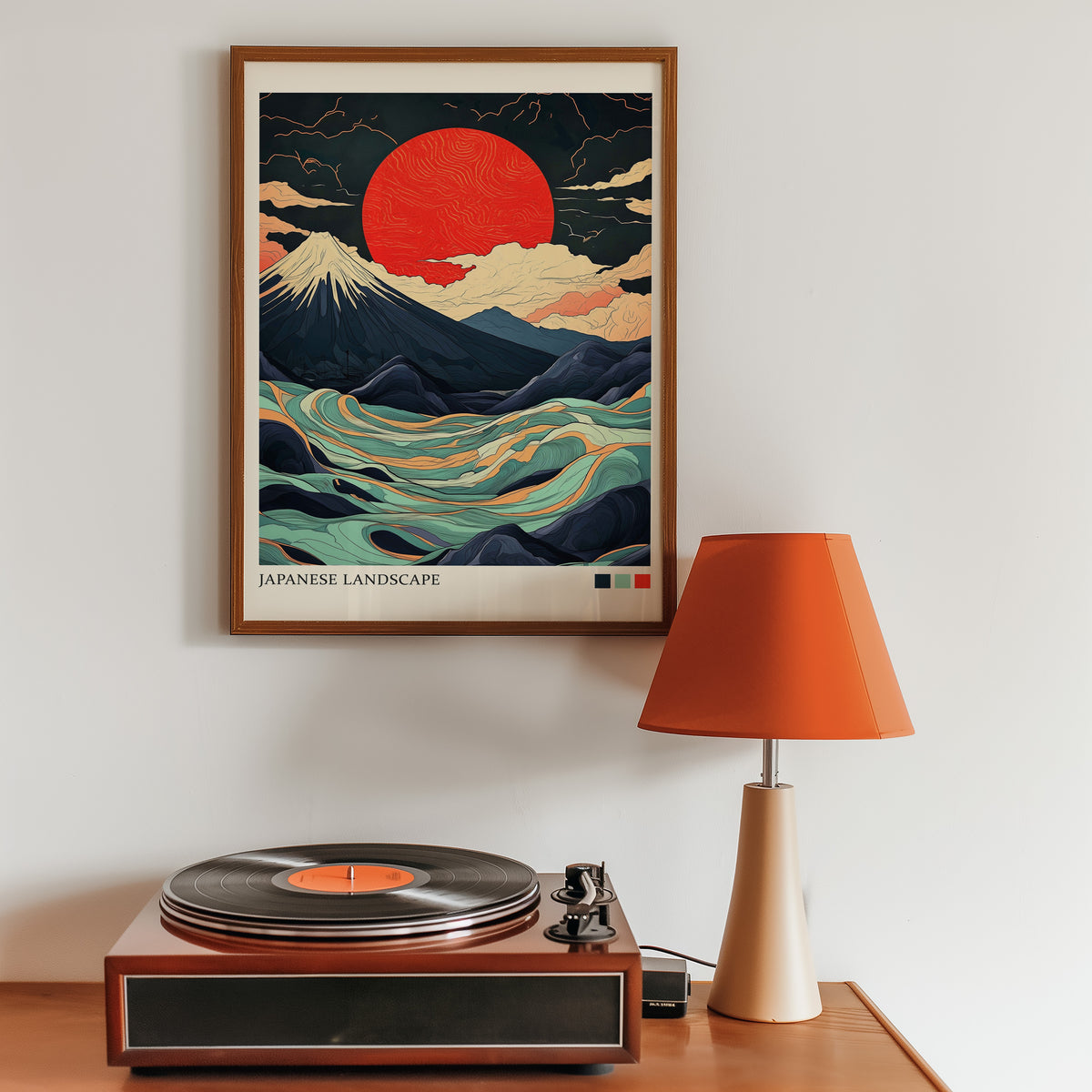 Fuji teal waves red sun print in a walnut frame above a sideboard with a record player