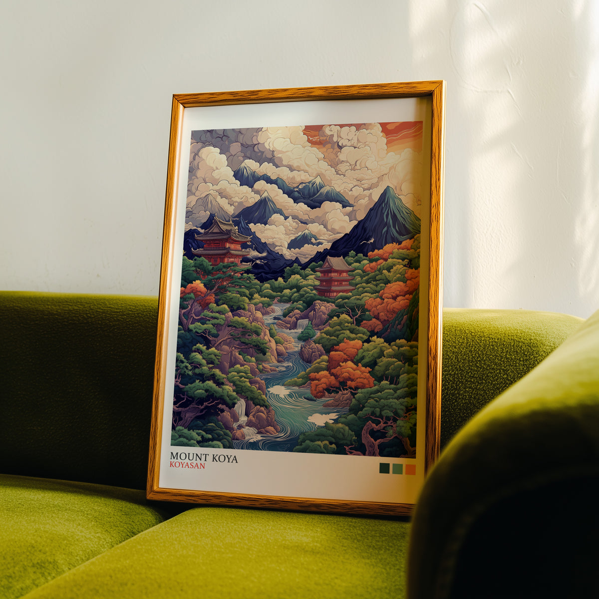 Mount Koya red temple ukiyo-e print in an oak frame propped on a green velvet sofa