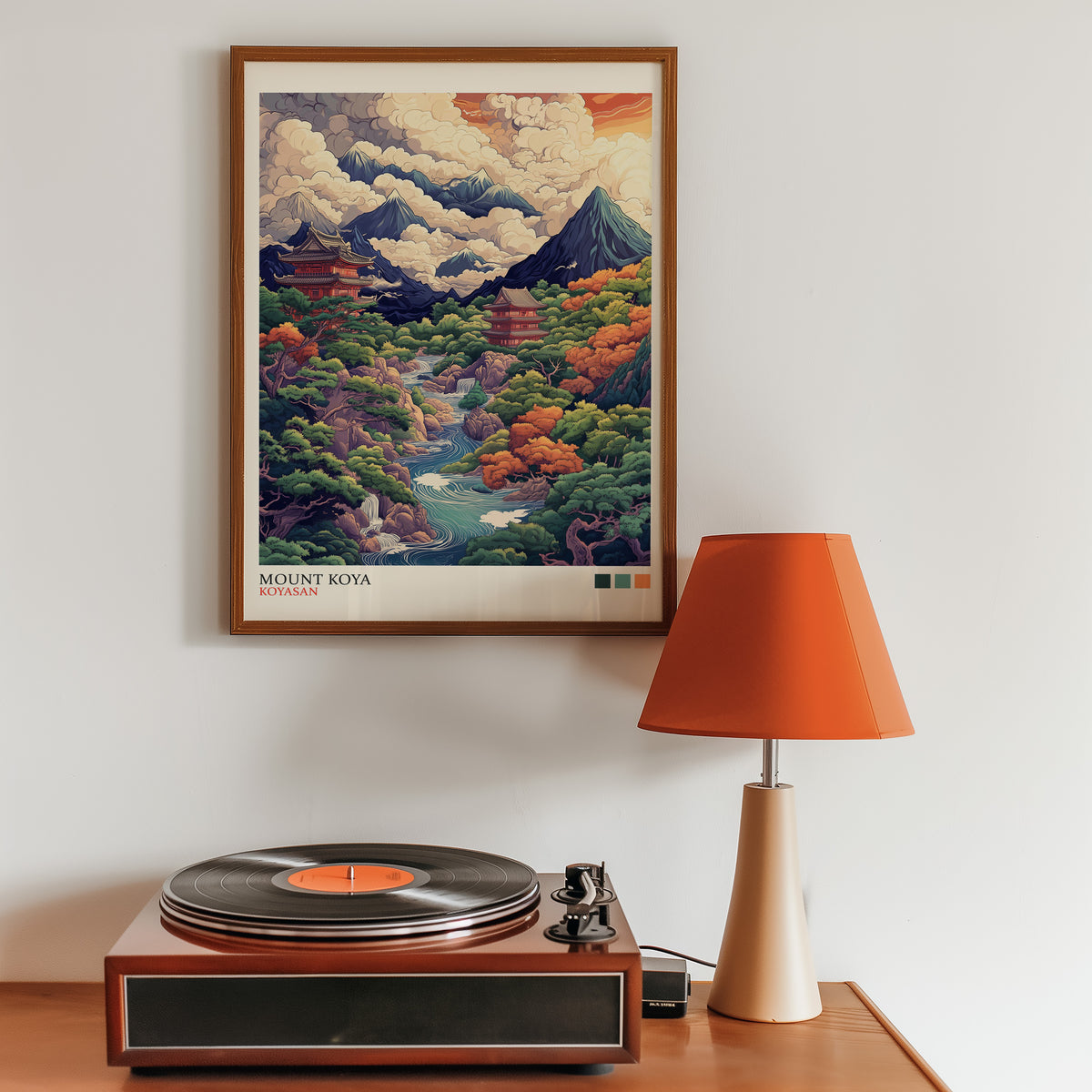 Mount Koya red temple ukiyo-e print in a walnut frame above a sideboard with a record player