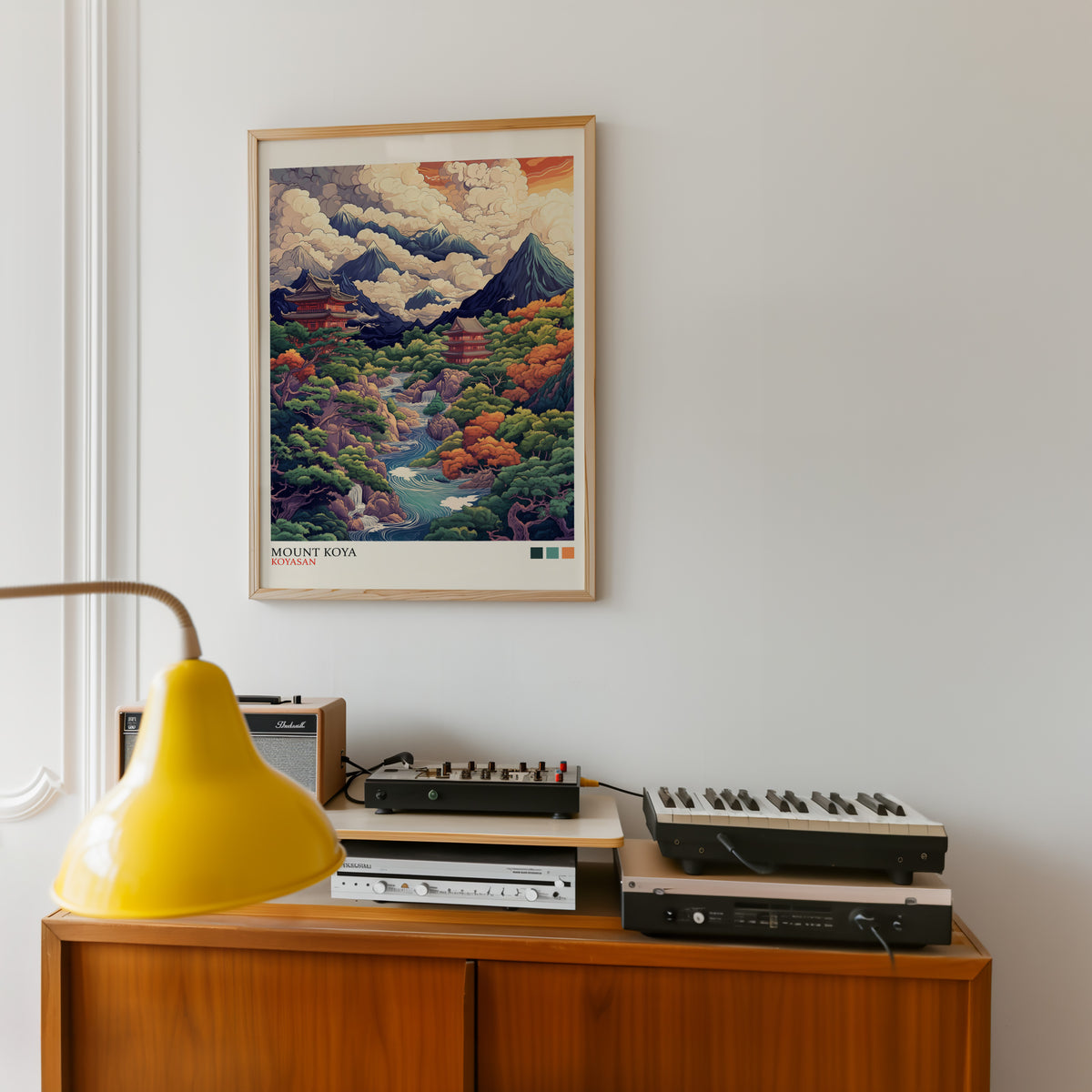 Mount Koya red temple ukiyo-e print in an oak frame above a teak sideboard with vintage hi-fi