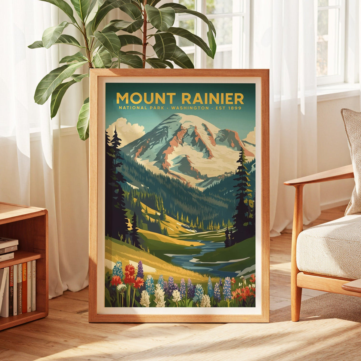 Mount Rainier National Park print in an oak frame by a sunlit window with sheer curtains and a fig plant