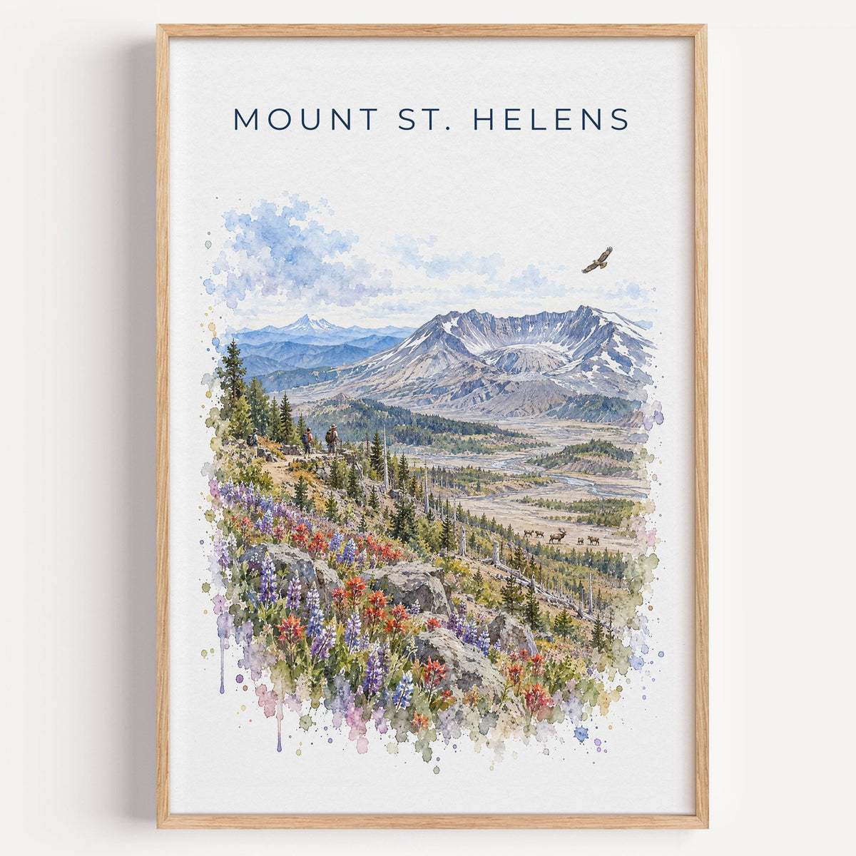 Mount St. Helens watercolor print in a light oak frame on a plain white wall