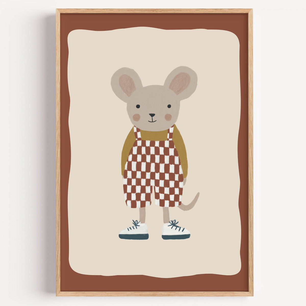 Mouse checkered overalls nursery print in a light oak frame on a plain white wall