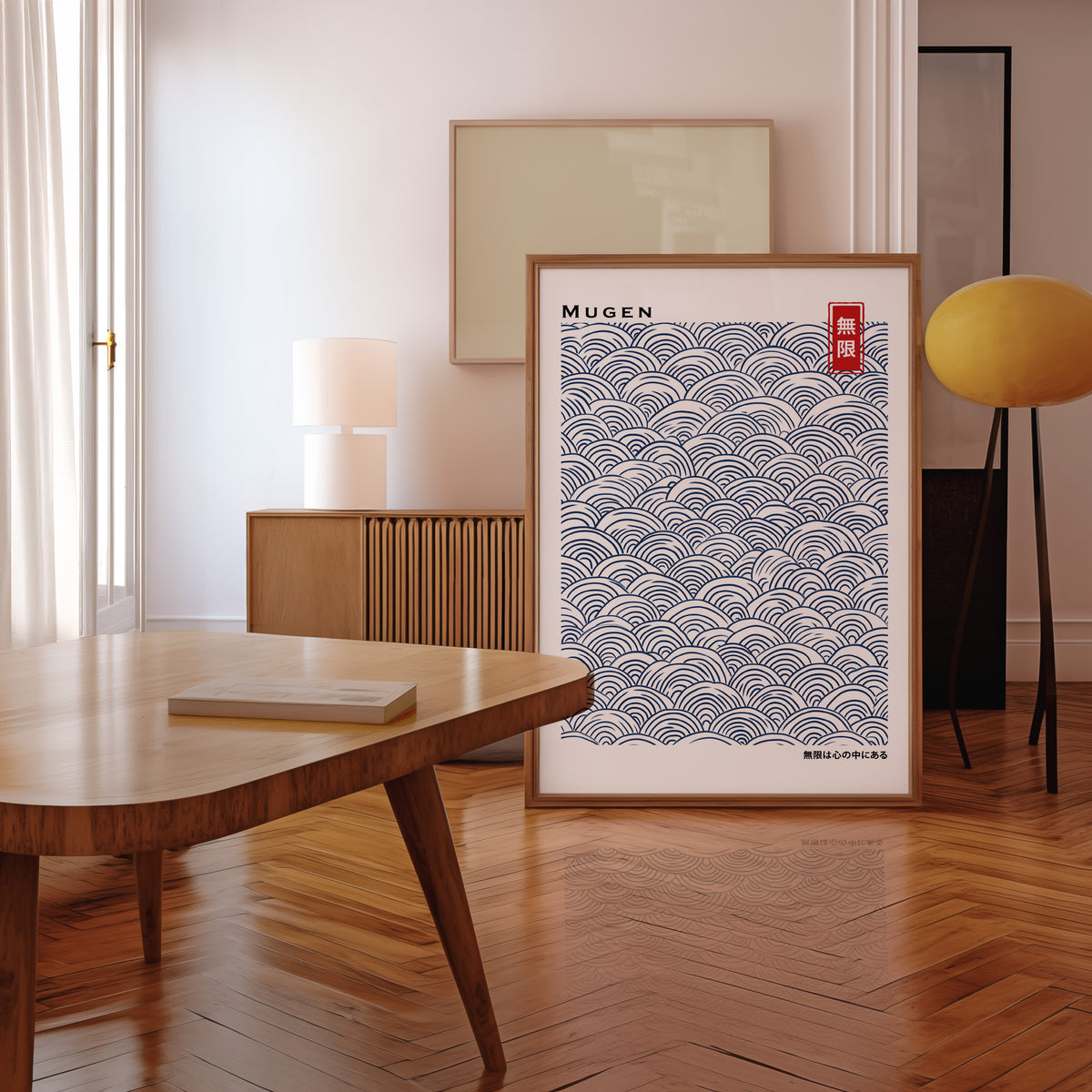 Navy seigaiha wave pattern print in a walnut frame leaning in a mid-century living room