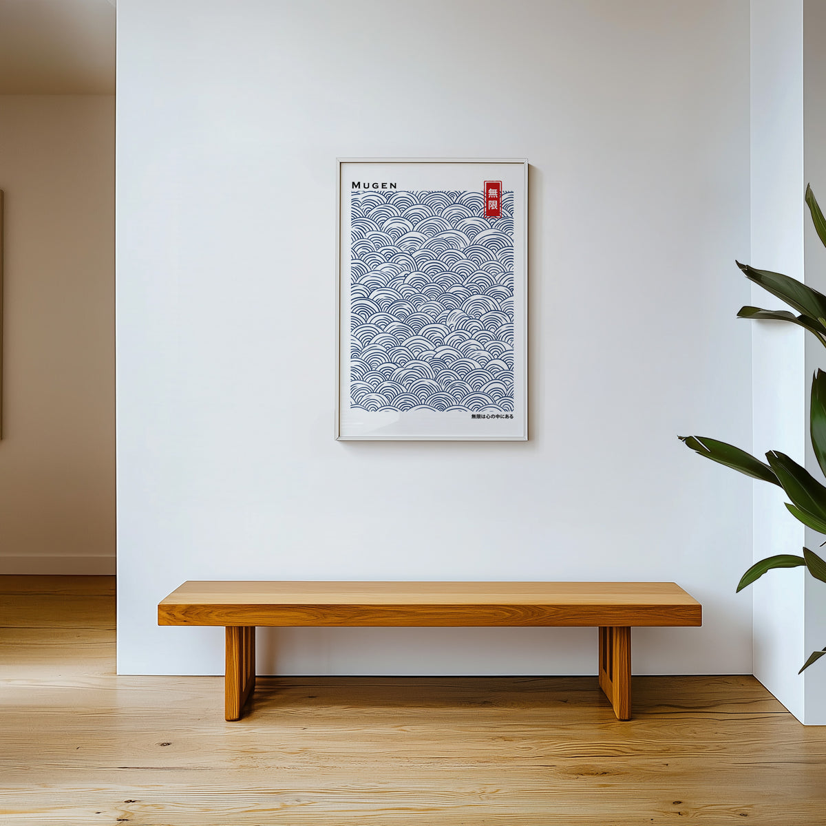 Navy seigaiha wave pattern print shown in a white frame above a wooden entryway bench