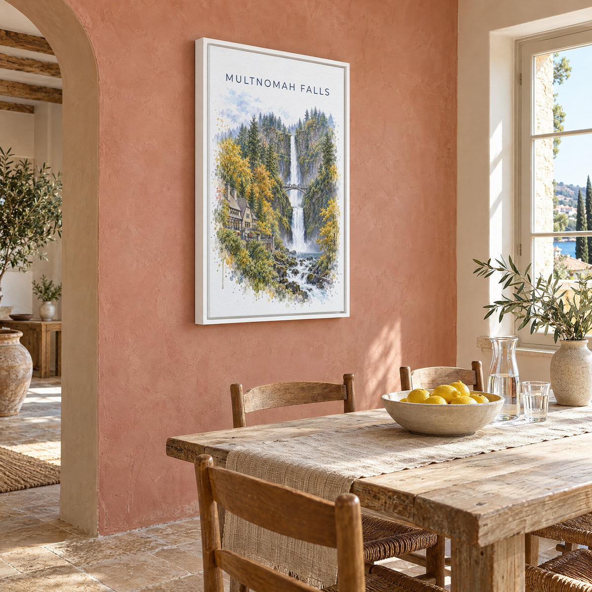 Multnomah Falls watercolor print as a white floater canvas on a terracotta wall above a rustic dining table