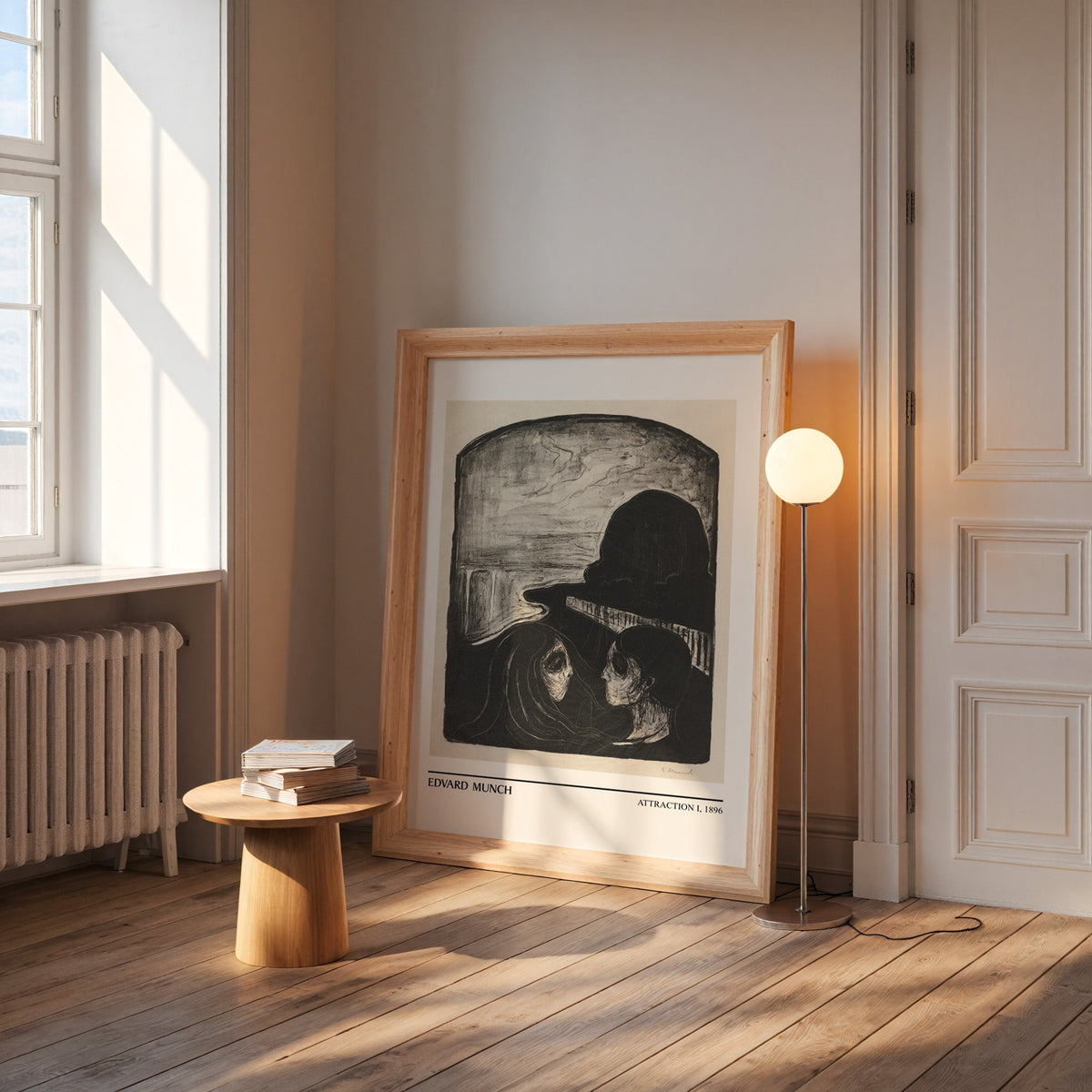 Munch lithograph in a wide pine frame leaning by a sunlit window