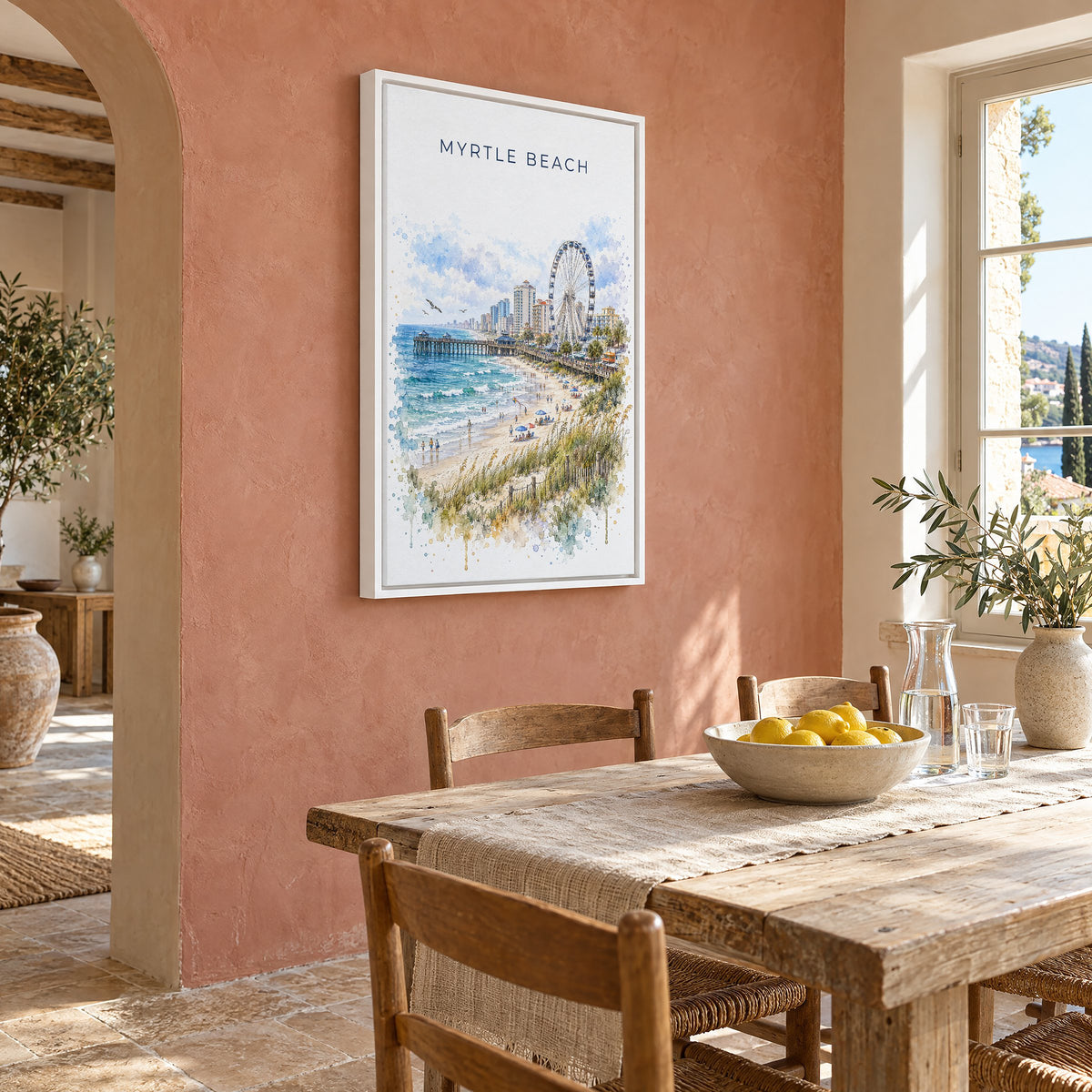 Myrtle Beach watercolor print as a white floater canvas on a terracotta wall above a rustic dining table