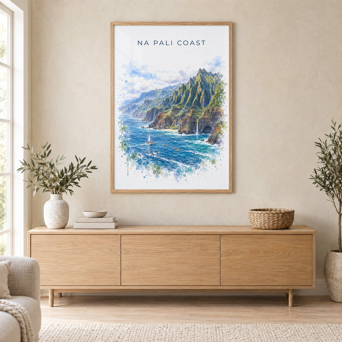 Na Pali Coast watercolor print in an oak frame above a light wood sideboard in a Scandinavian living room