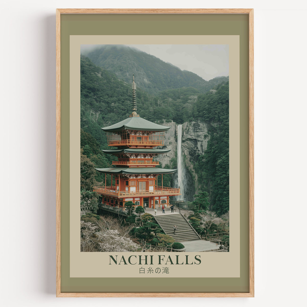 Nachi Falls and red pagoda print in a light oak frame on a plain white wall