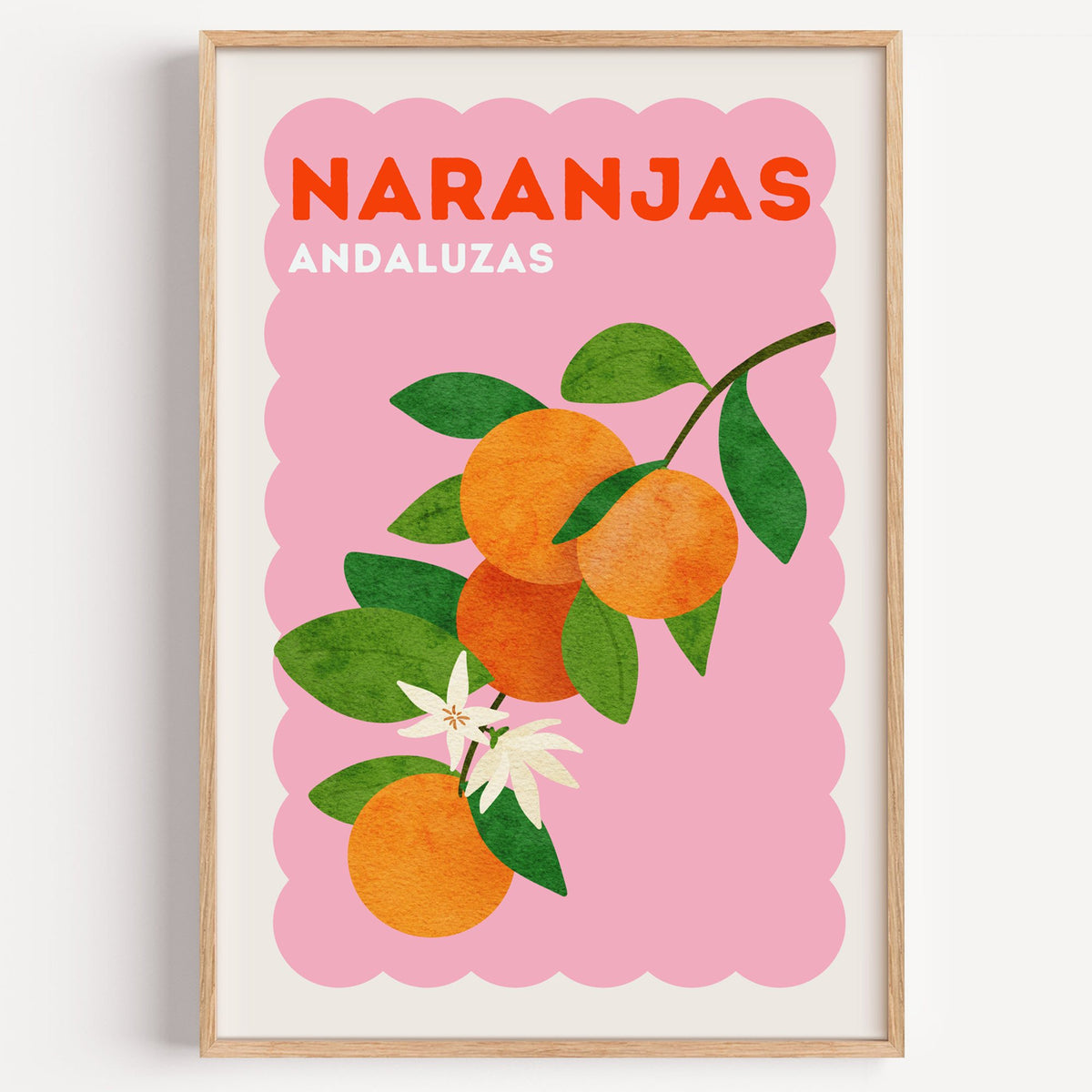 Naranjas Andaluzas orange branch print in a light oak frame on a plain white wall