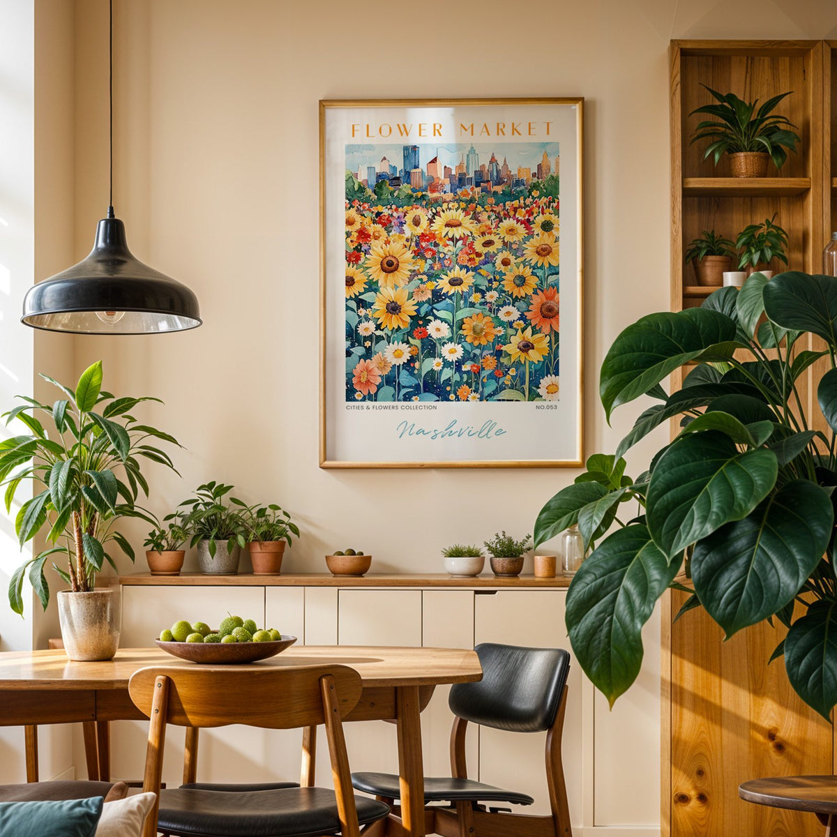Nashville flower market print in an oak frame above a dining sideboard lined with potted plants